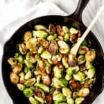 Bacon brussels sprouts with text overlay.