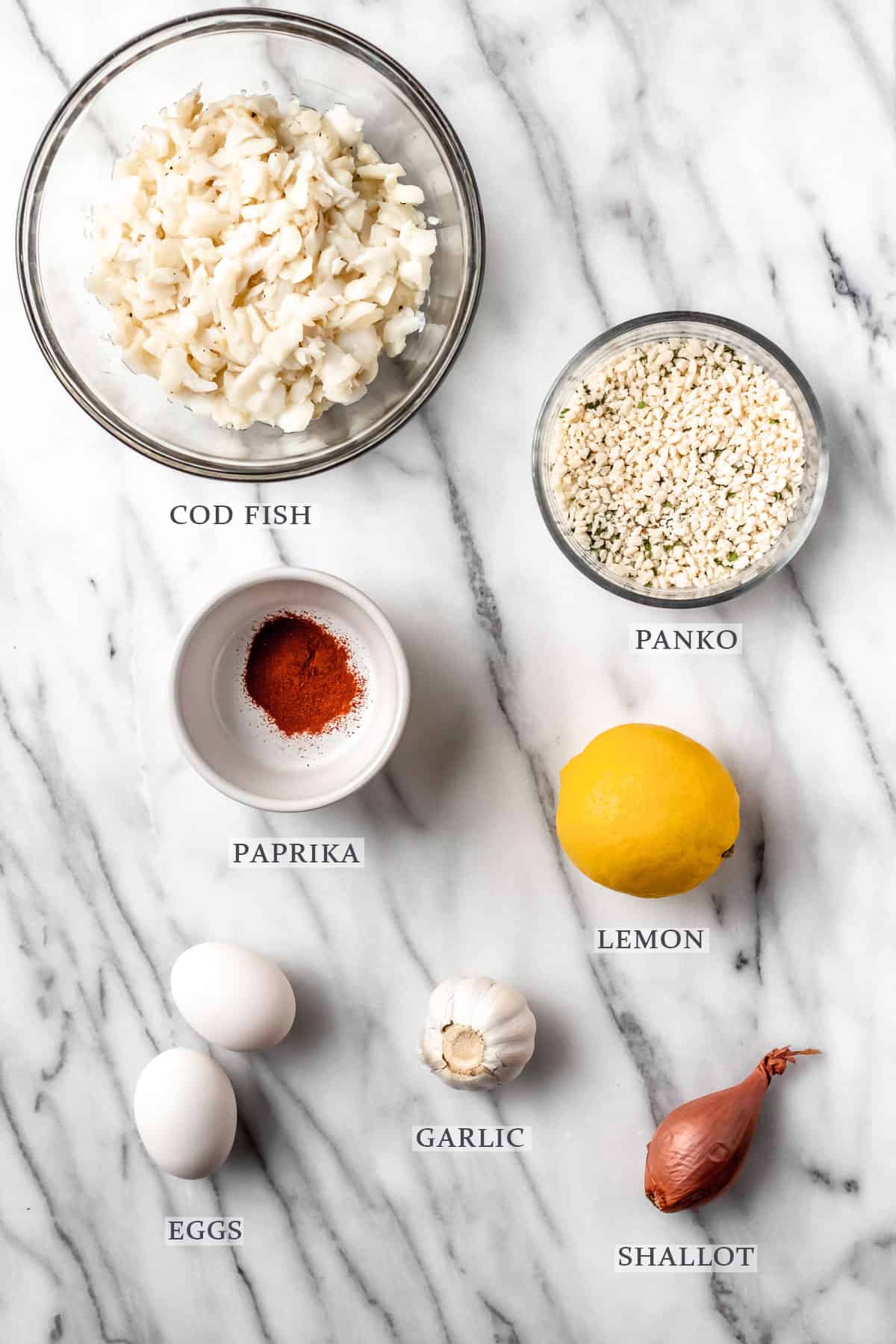 Ingredients needed to make cod cakes with text overlay.