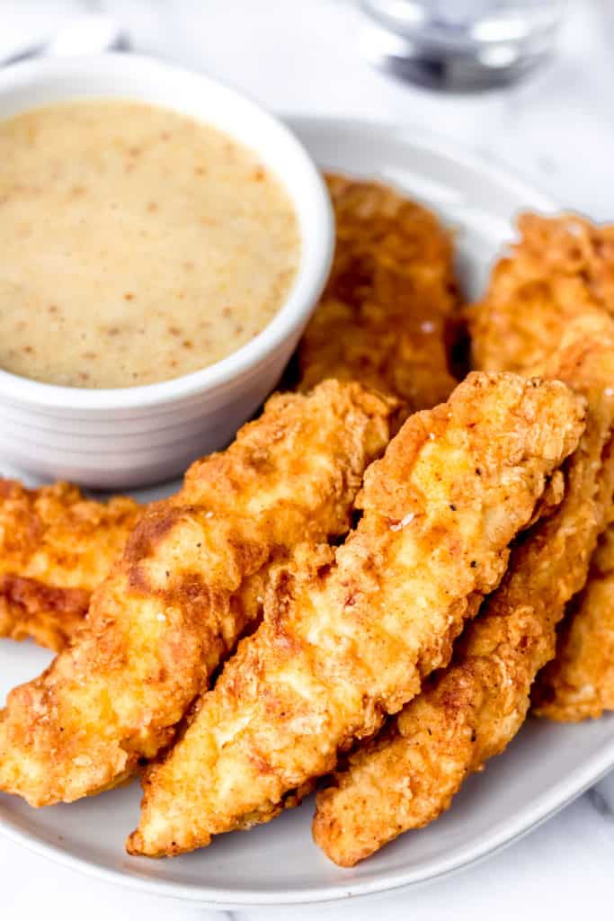 Crispy Pan-Fried Chicken Tenders - Delicious Little Bites