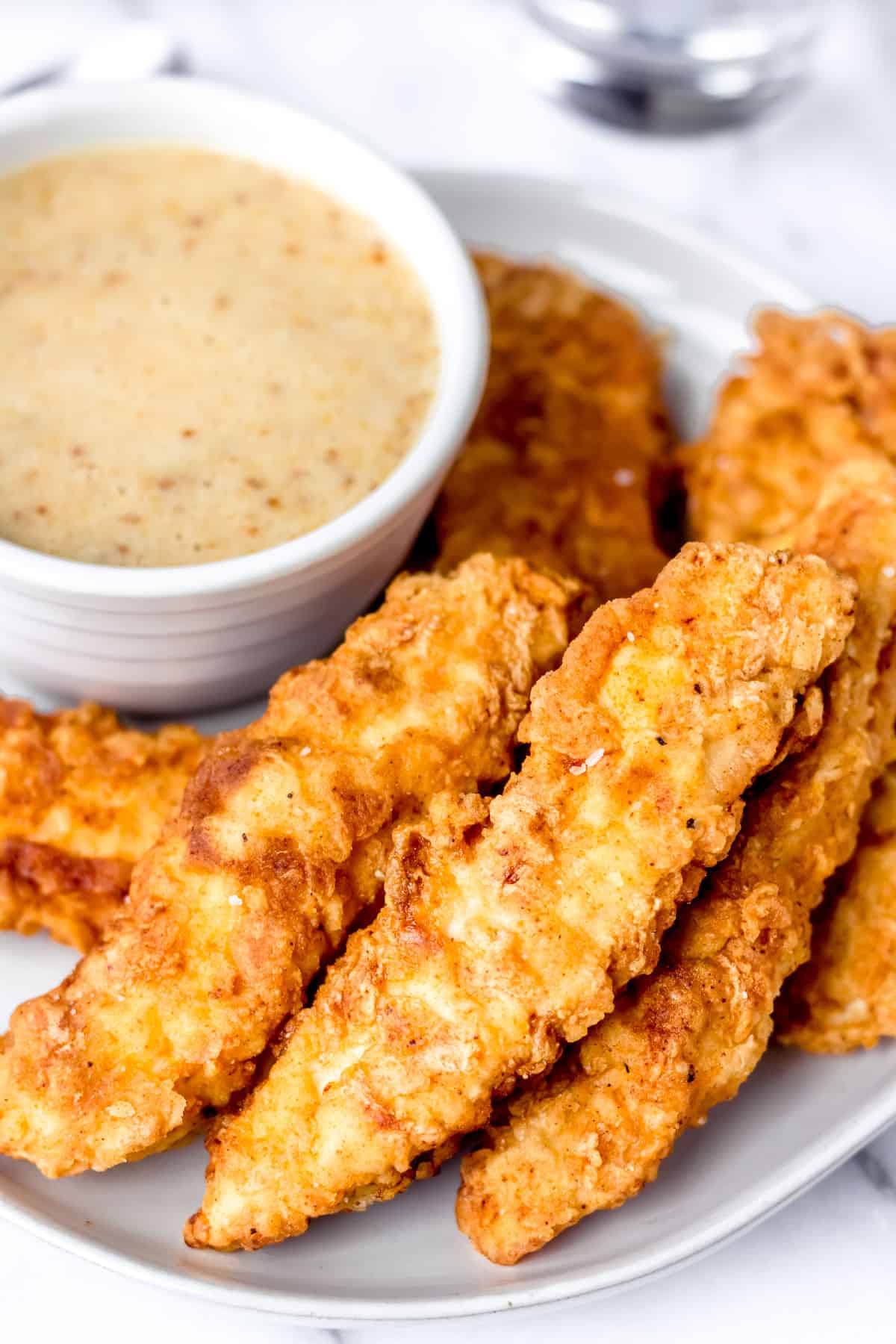 Crispy Pan-Fried Chicken Tenders - Delicious Little Bites