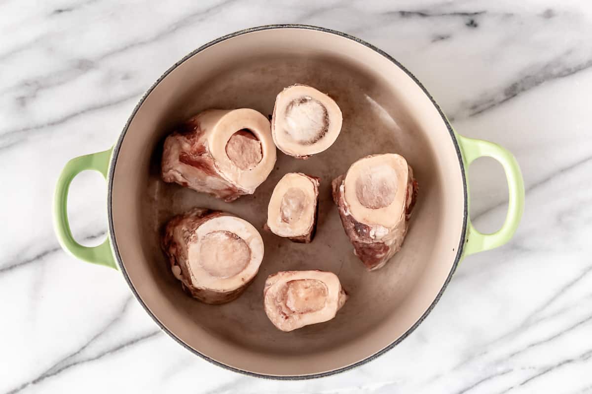 Beef bones in a Dutch oven.