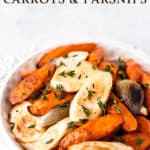 A bowl fo roasted carrots and parsnips with text overlay.