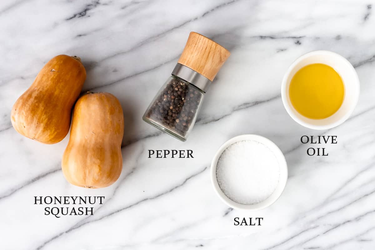 Ingredients to make roasted honeynut squash with text overlay.