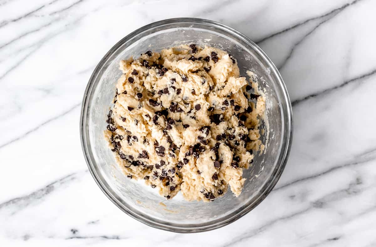 Chocolate chip scone dough in a glass mixing bowl.