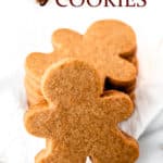 Gingerbread man cookies with text overlay.