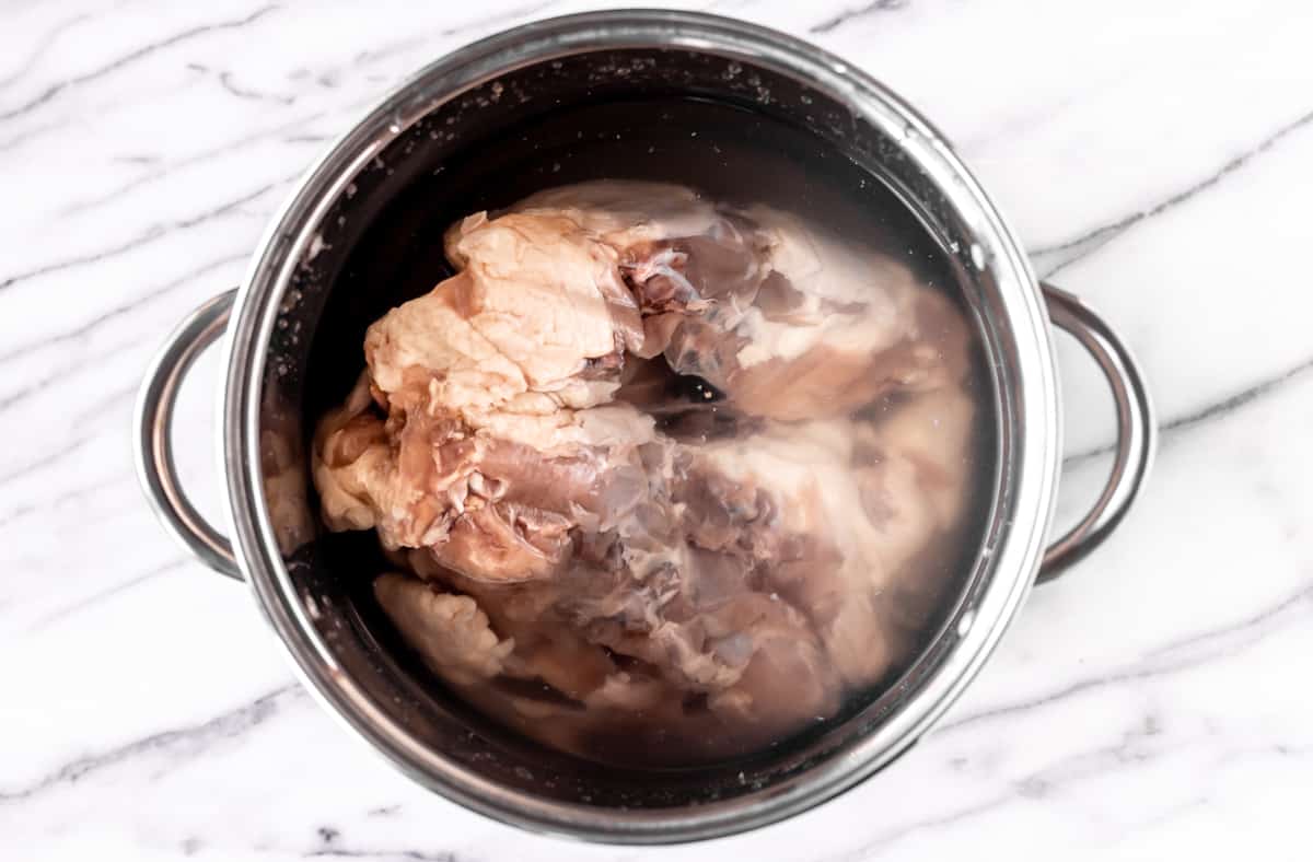 Chicken bones and water in a large stock pot.