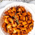 Roasted honeynut squash in a bowl with text overlay.