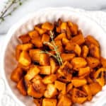Roasted honeynut squash in a bowl with text overlay.