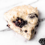Close up of a single blackberry scone.