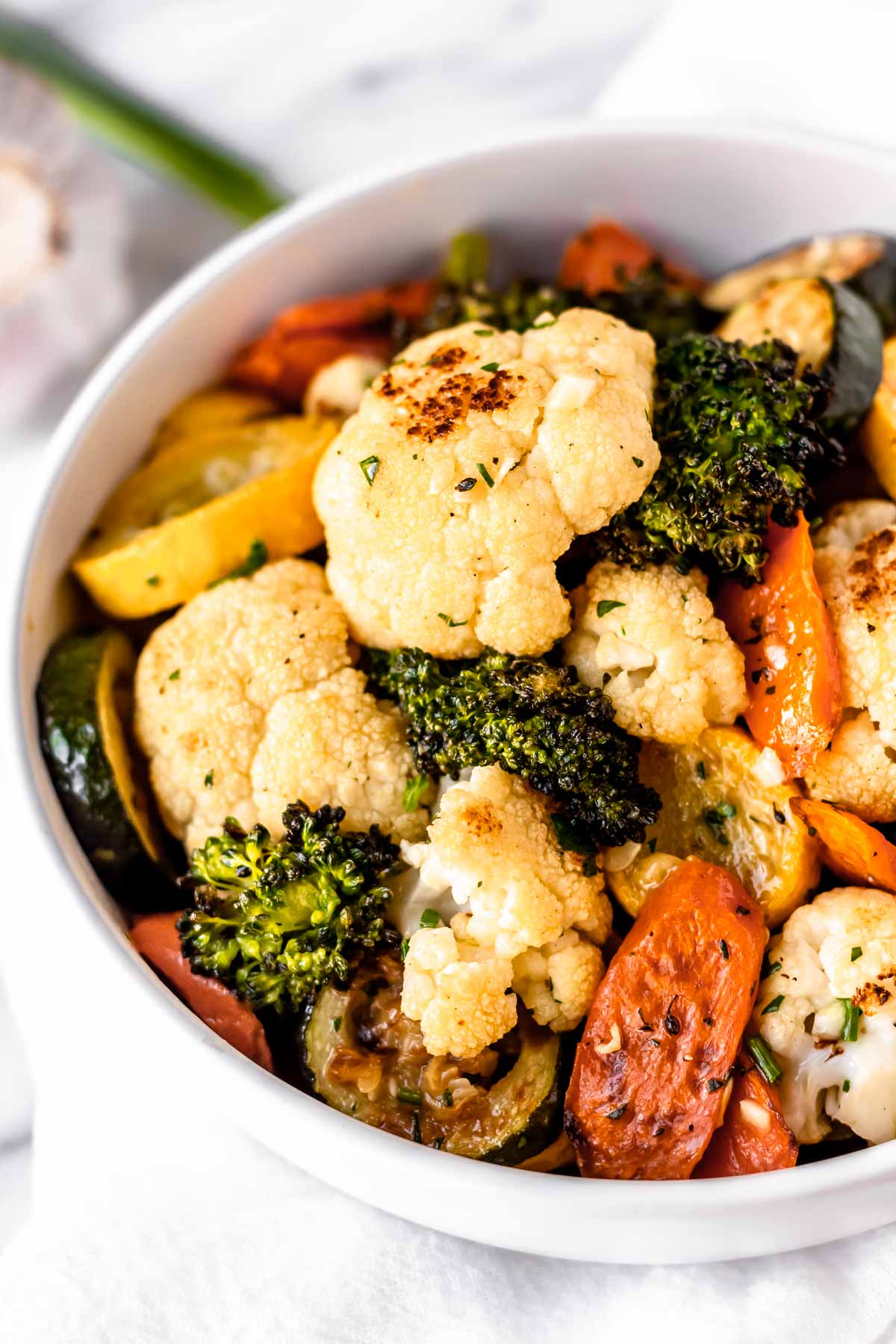 Close up of Normandy blend vegetables in a white bowl.