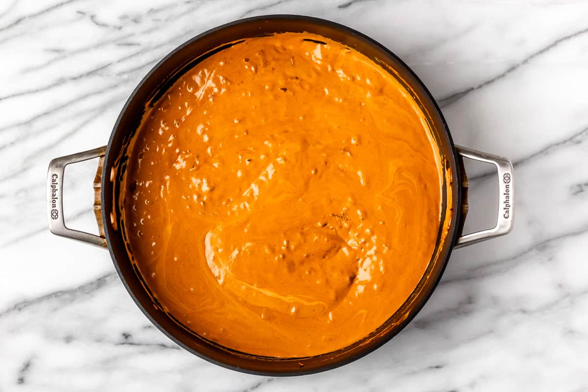 Indian butter sauce in a black skillet.