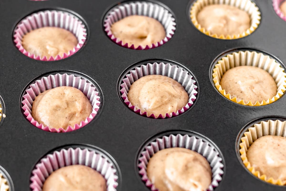 Cupcake liners filled with cake batter.