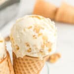 Close up of an maple walnut ice cream cone with text overlay.