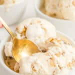 Close up of maple walnut ice cream in a bowl with a spoon and text overlay.