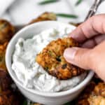 Greek zucchini fritters with text overlay.