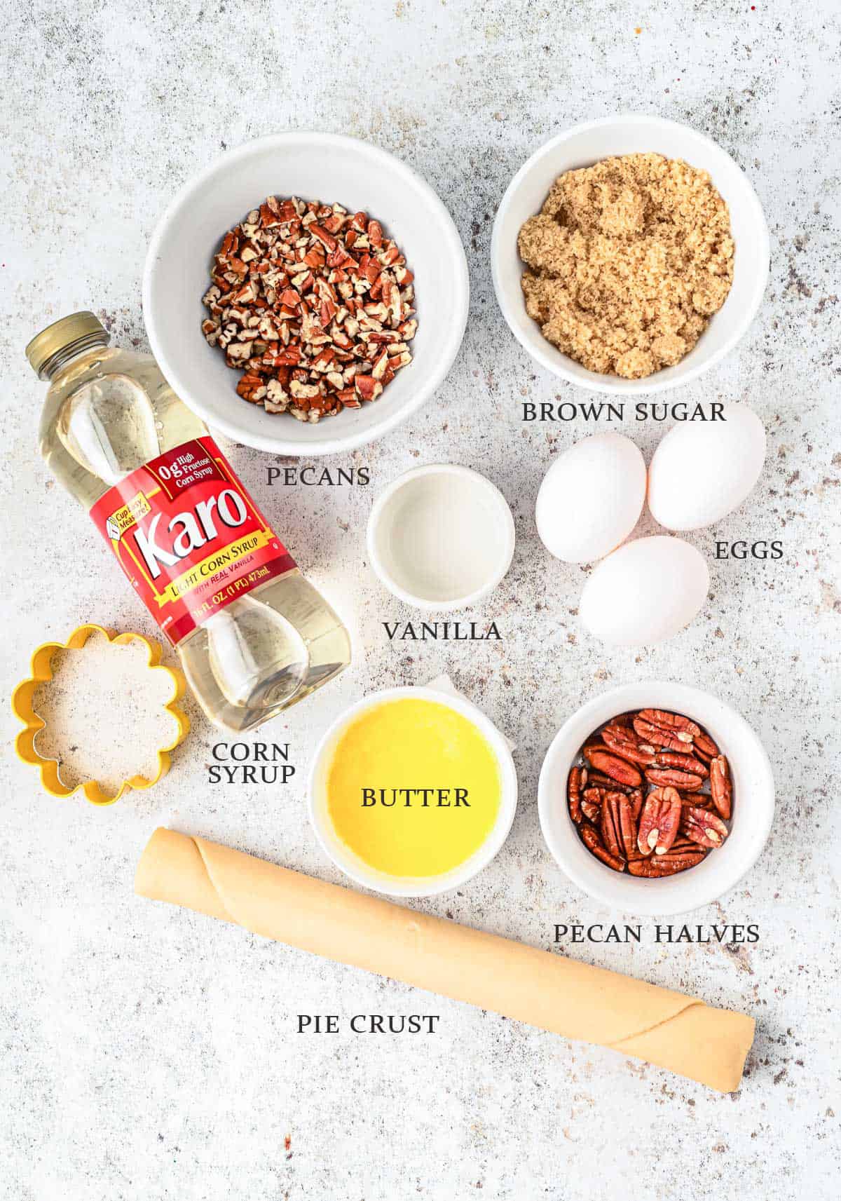 Ingredients needed to make mini pecan pies with text overlay.