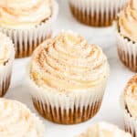 Pumpkin spice cupcakes with text overlay.