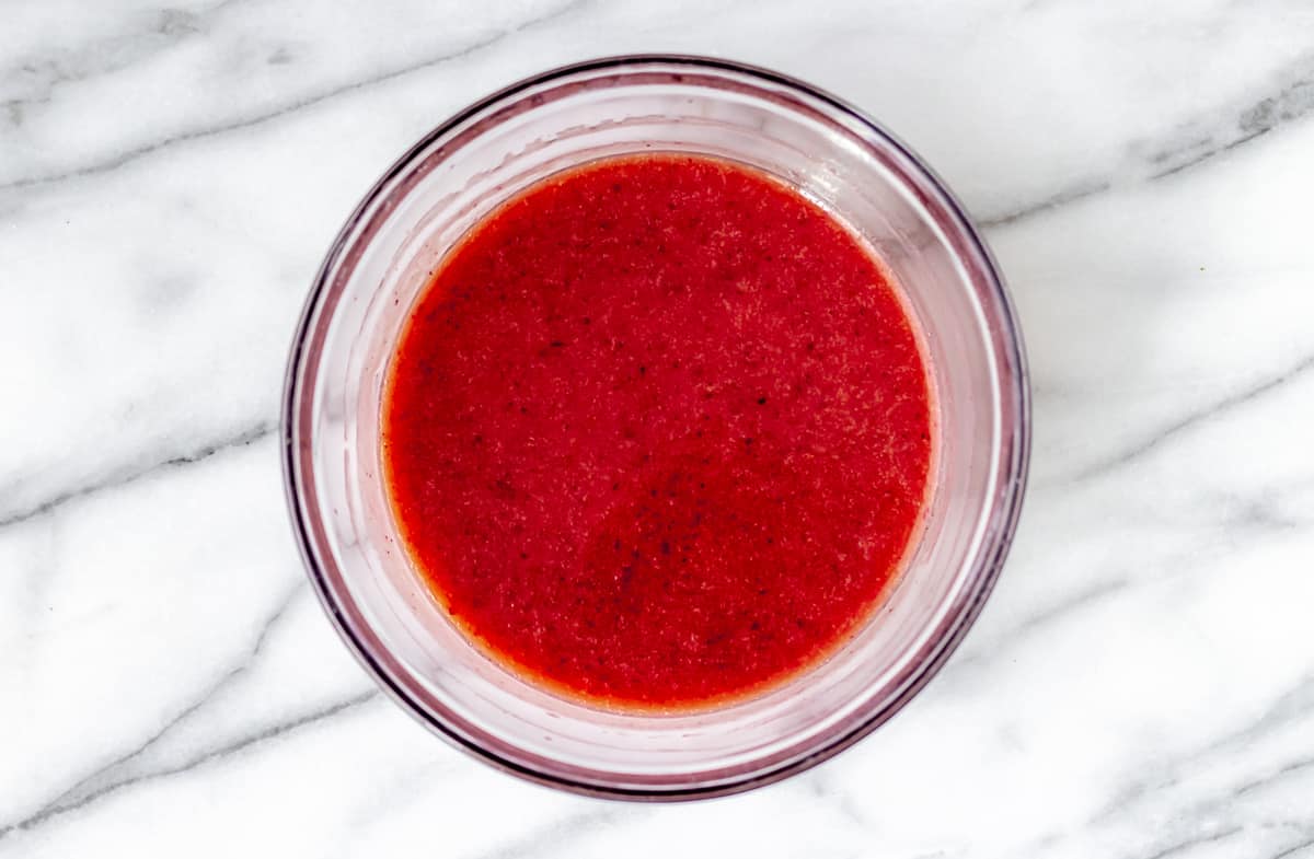 Cranberry salad dressing in a glass bowl.