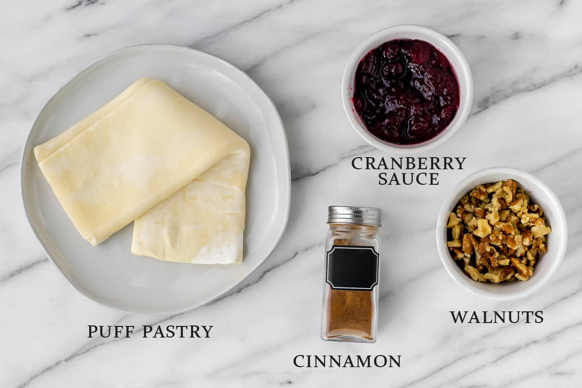 Ingredients to make cranberry walnut cups with text overlay.