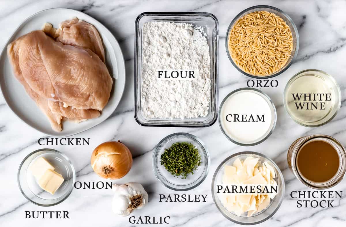 Ingredients to make a parmesan chicken and orzo skillet.