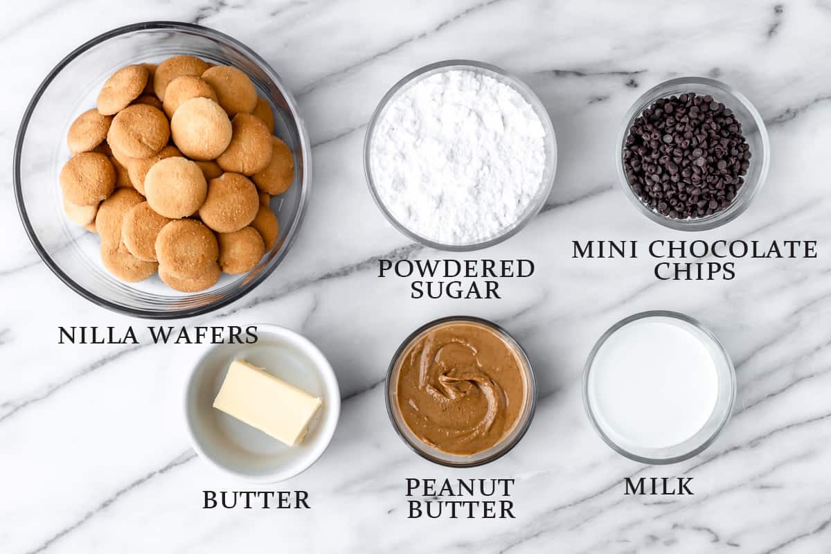 Ingredients to make peanut butter chocolate nilla wafers on a marble background with text overlay.