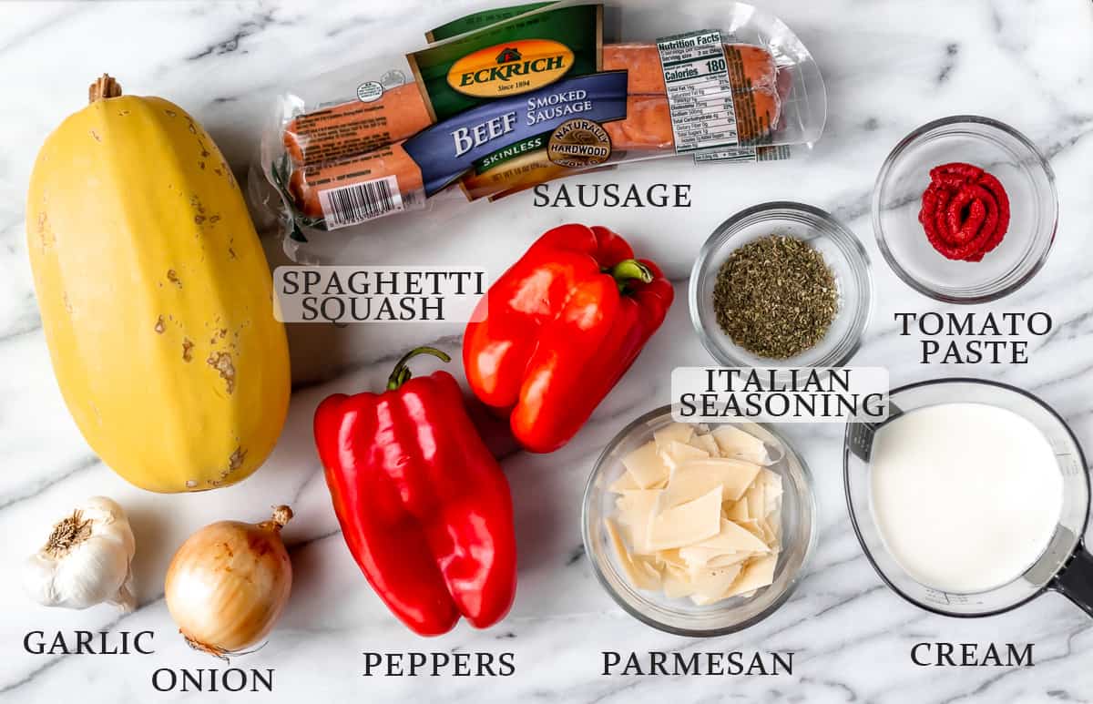 Ingredients needed to make a sausage and spaghetti squash skillet with text overlay.
