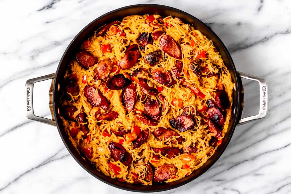 Sausage, spaghetti squash and vegetables in a skillet.