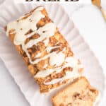 Overhead of apple fritter bread on a white serving plate with a slice cut out and text overlay.