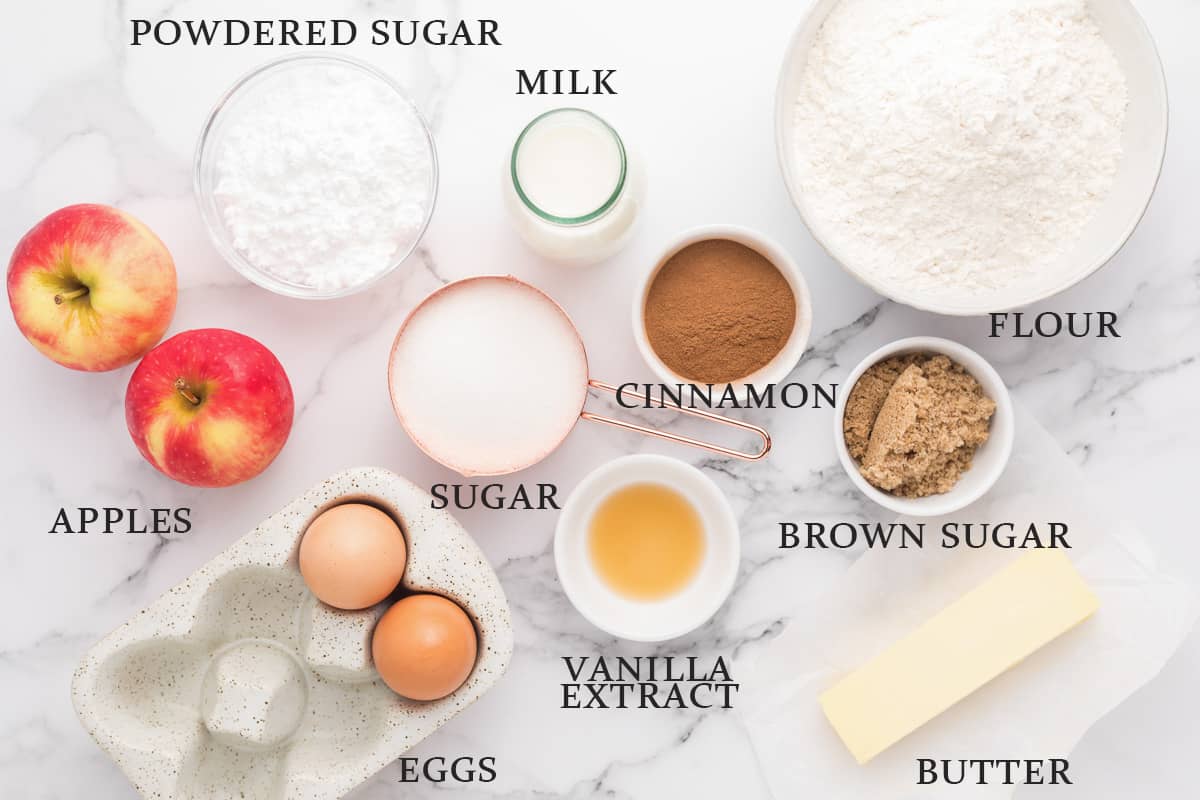 Ingredients needed to make apple fritter bread in bowls on a white background with text overlay.