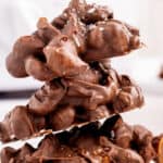 Chocolate peanut clusters with text overlay.