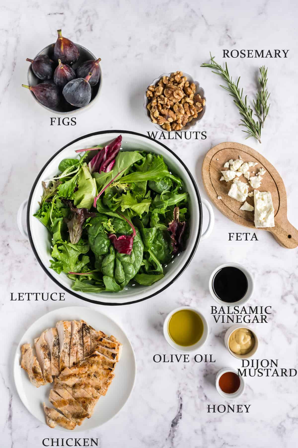 Ingredients needed to make a fig salad laid out on a light background with text overlay.