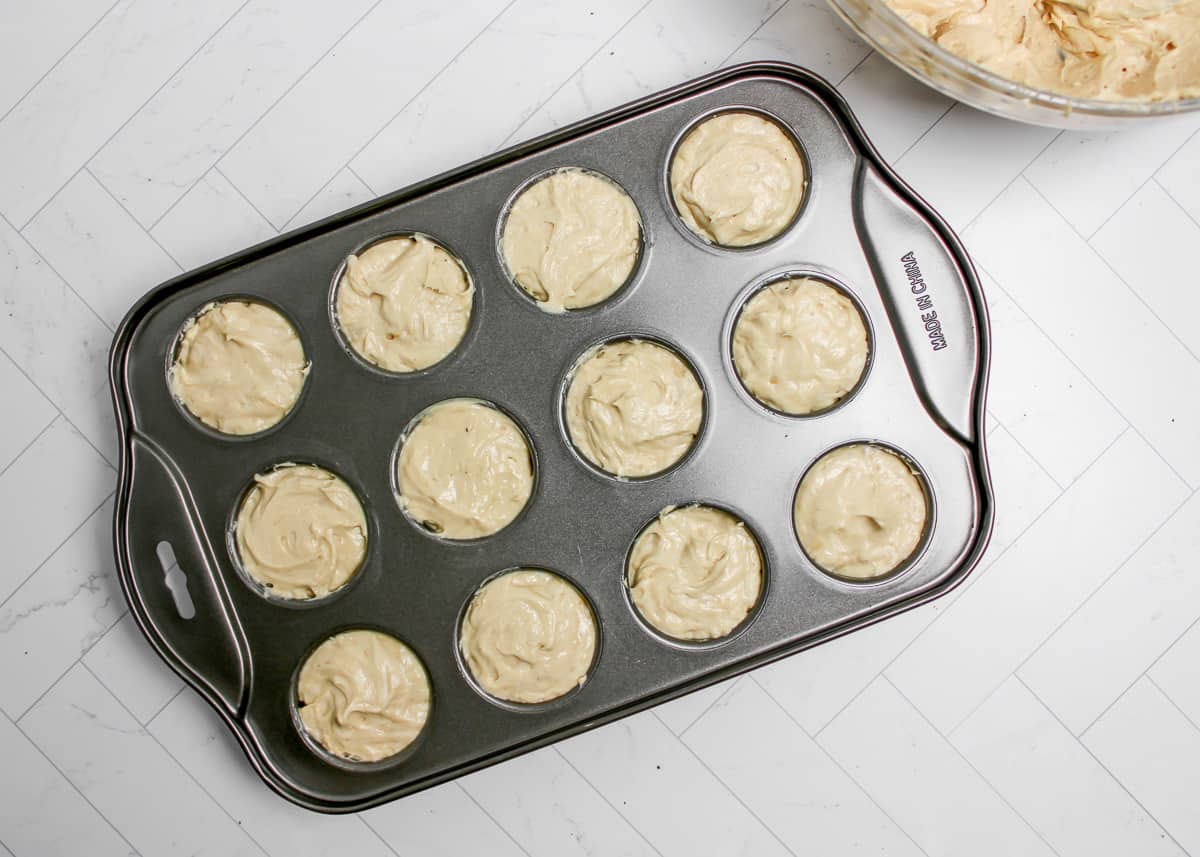 Mini peanut butter pies in a muffin pan.