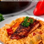 Cajun Salmon Pasta on a plate with text overlay.