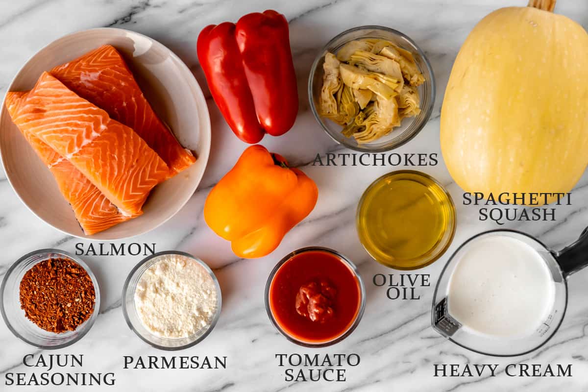 Ingredients needed to make Cajun Salmon Pasta with text overlay.