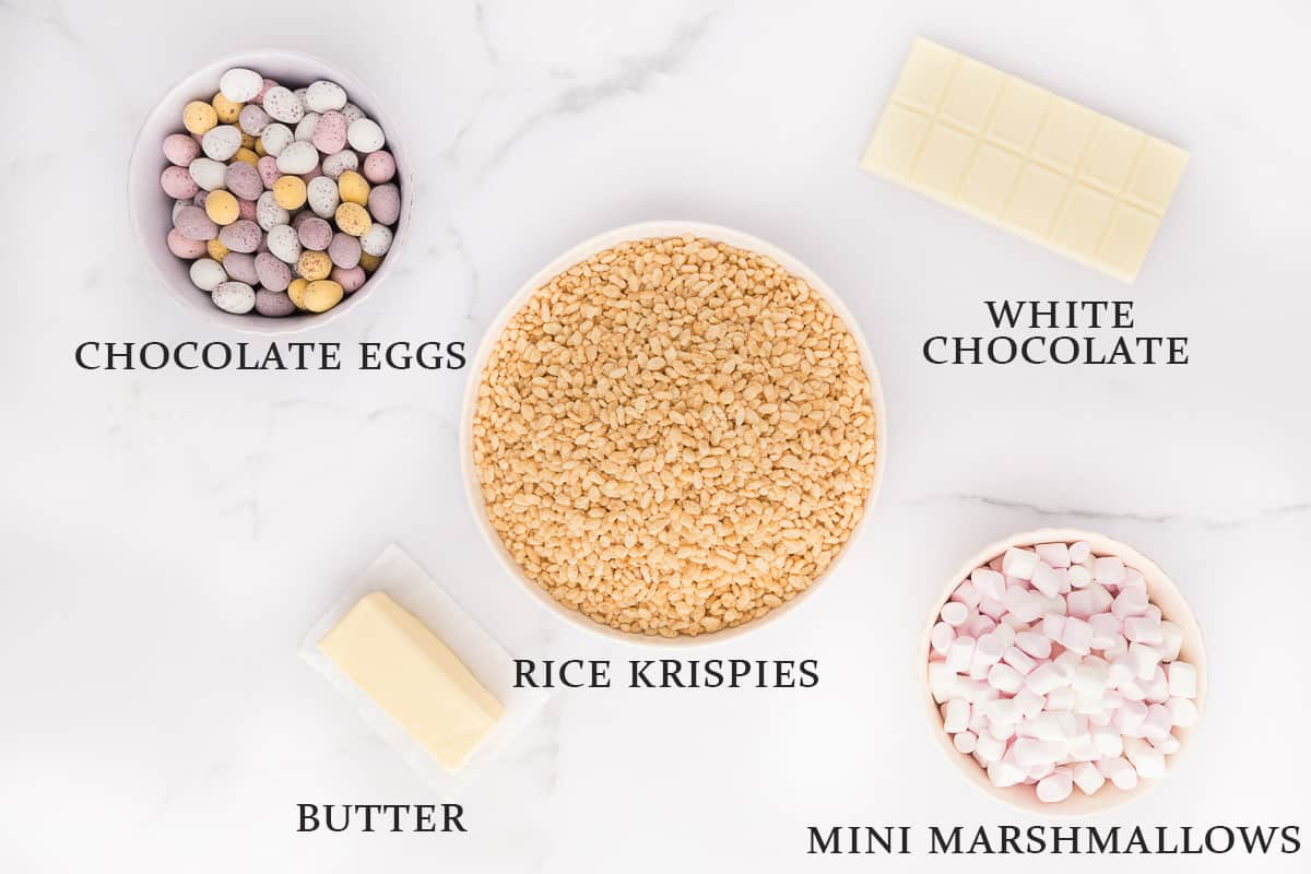 Ingredients needed to make Easter Rice Krispie Treats on a white background with text overlay.