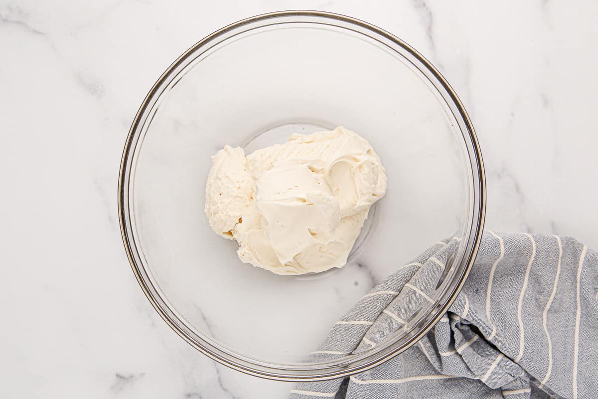 Cream cheese mixture in a glass bowl.