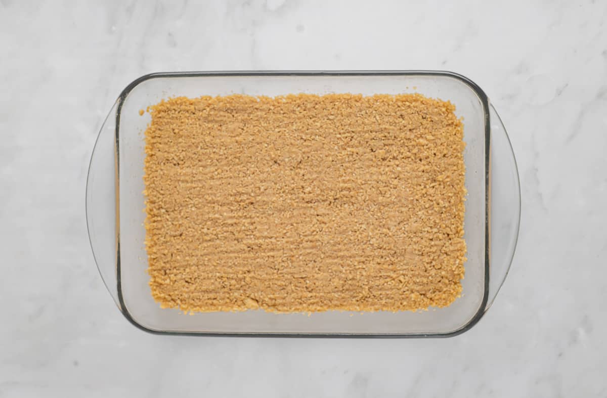 Graham cracker crust in the bottom of a 9x13 inch baking dish.