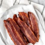 Air fried turkey bacon on a plate with text overlay.