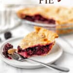 A slice of blackberry pie on a small plate with a fork with text overlay.