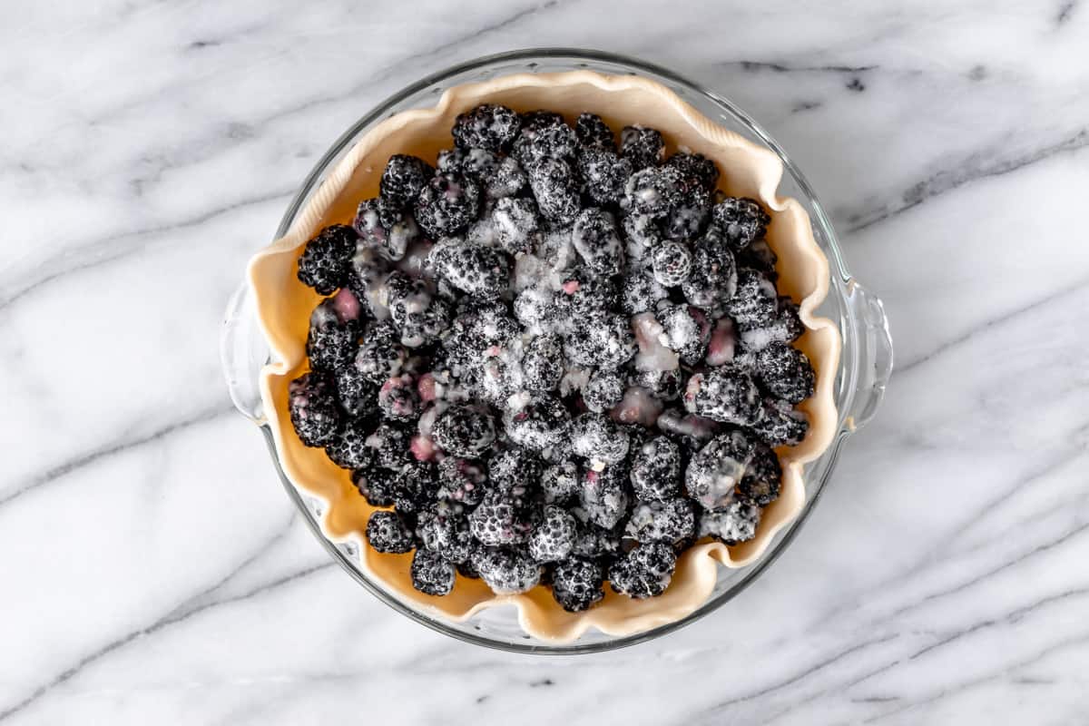 A pie crust filled with blackberries, sugar and cornstarch.