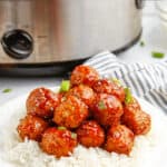 Korean BBQ Meatballs on a bed of rice with text overlay.