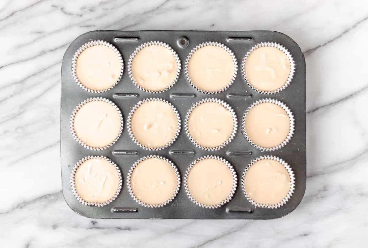 Cheesecake batter in a cupcake pan.