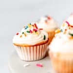 Mini sprinkle cupcakes with text overlay.