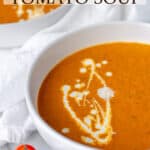 A bowl of roasted tomato soup with text overlay.