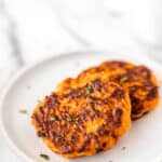 Sweet potato hash browns on a plate with text overlay.