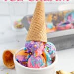 Unicorn ice cream in a bowl with a cone with text overlay.