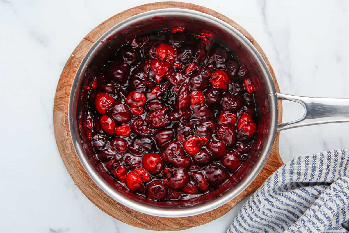 Cherry pie filling in a sauce pan.