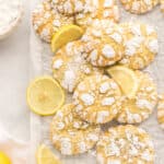 Lemon crinkle cookies and lemon slices with text overlay.