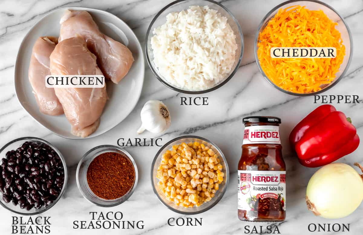 Ingredients needed to make a cheesy chicken taco casserole on a light background with text overlay.