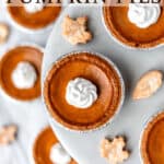 Overhead of mini pumpkin pies on a pie stand and around it with text overlay